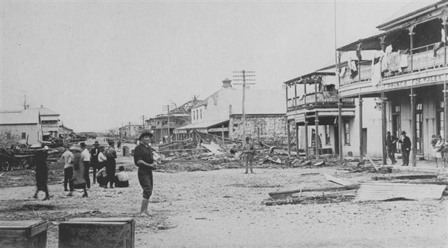 River Street, Mackay following the Cyclone. Image via the State Library